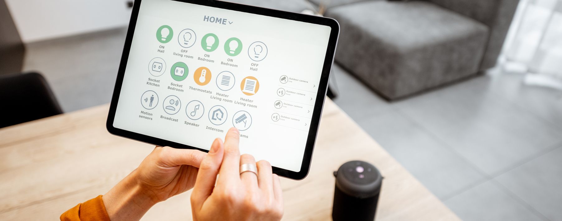Someone using a smart home tablet 