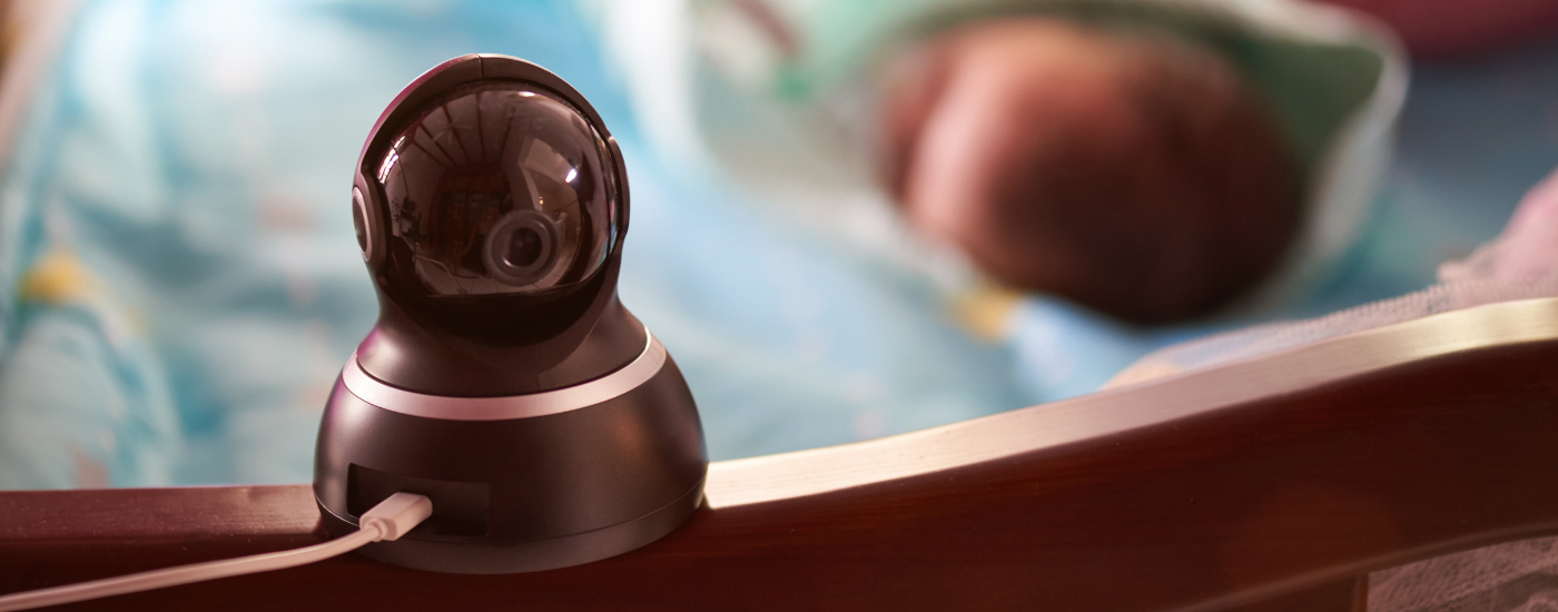 A smart camera looking over a baby in a crib