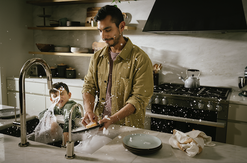 homeowner washing dishes in the kitchen