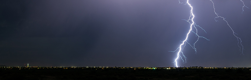 lightning strike above a city