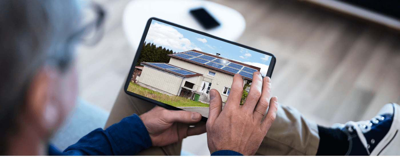 prospective homeowner house hunting on their tablet