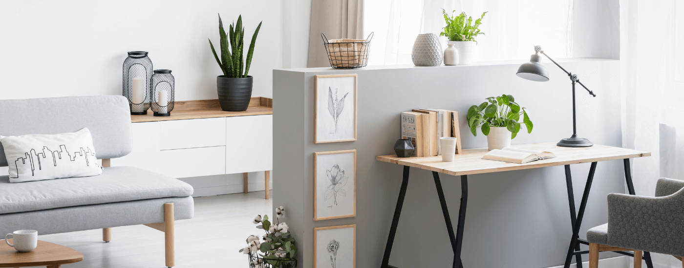 desk and living room area with a grey color scheme