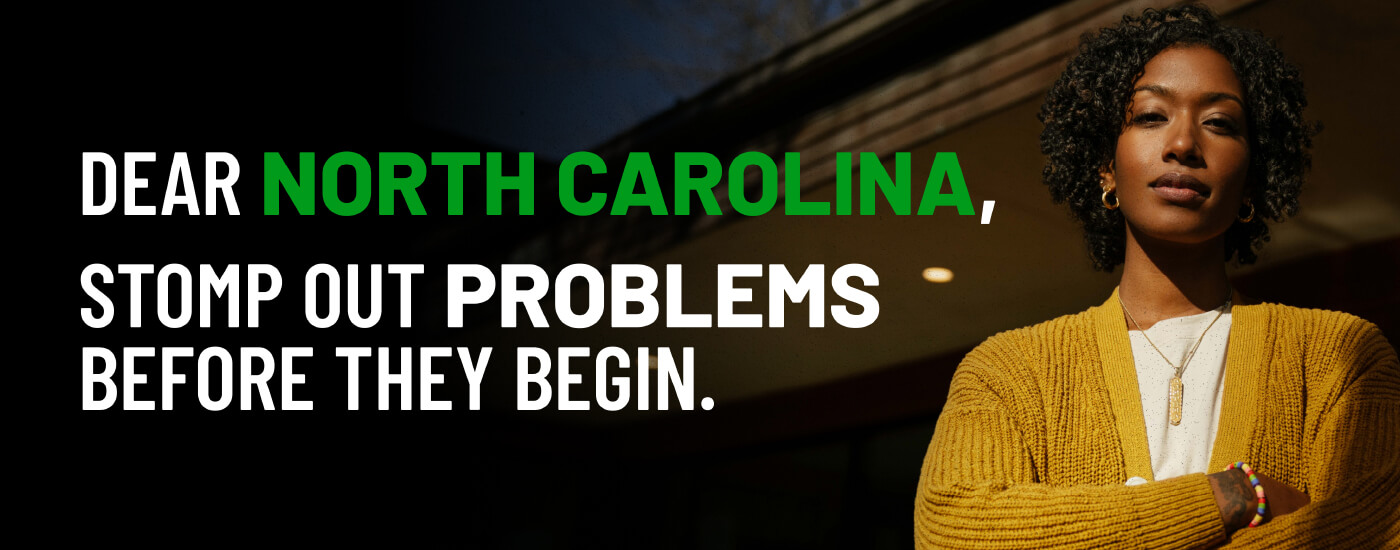 homeowner standing in the background with arms crossed and white letters saying, "Dear North Carolina, stomp out problems before they begin.