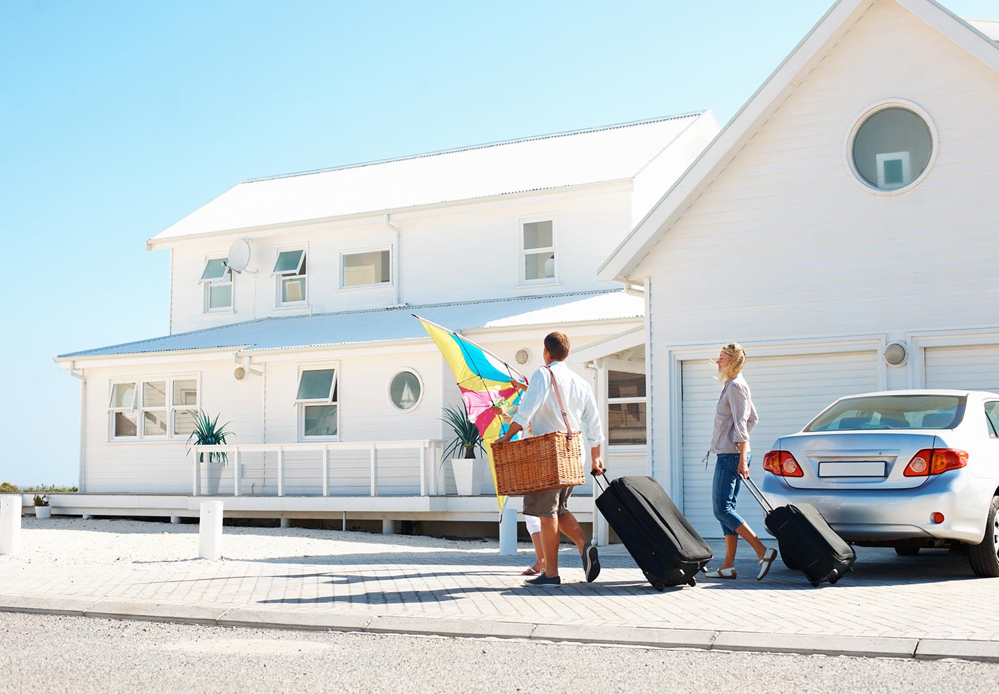 A family arrives at their vacation home