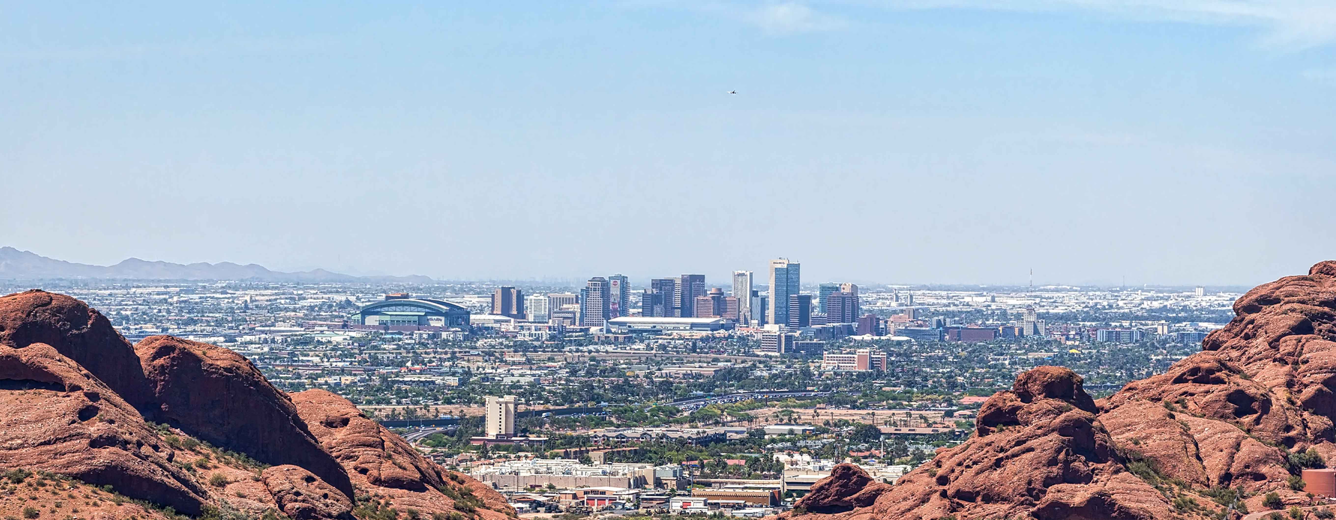 Image of the Phoenix skyline with rocky mountains in the foreground
