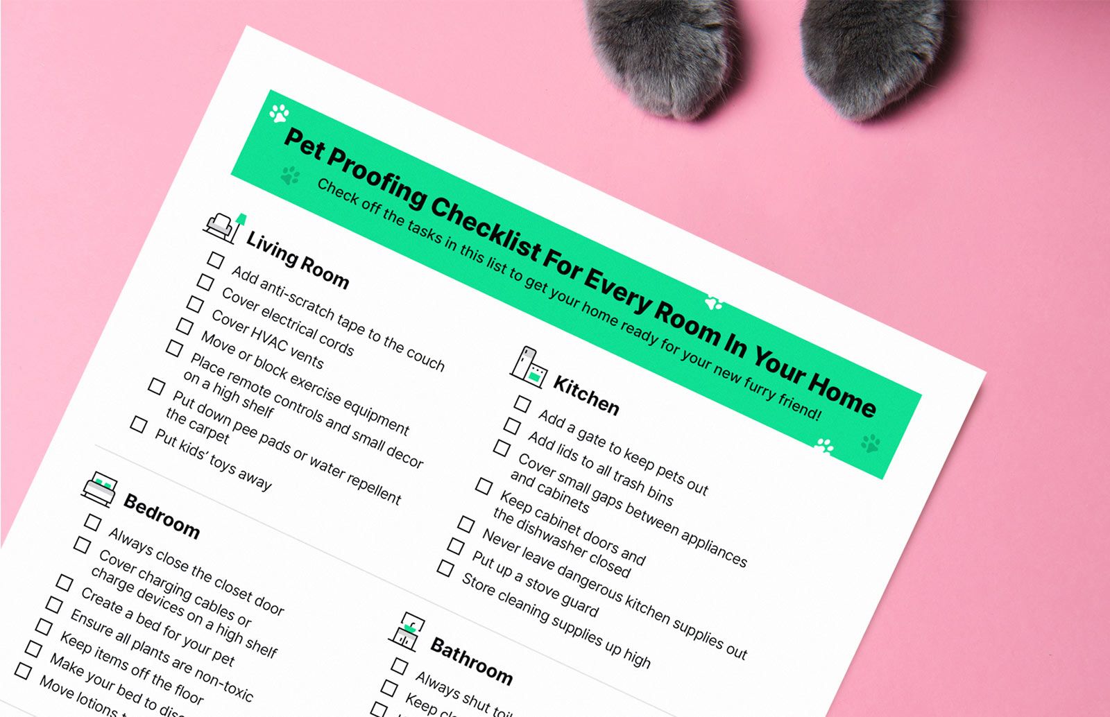 A pet proofing checklist on a piece of paper with a pink background and cat paws nearby