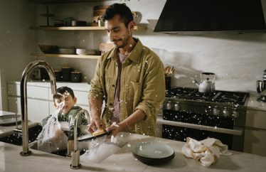 homeowner washing dishes in the kitchen