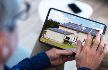 prospective homeowner house hunting on their tablet