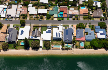 top level view of houses along a coastline