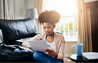 homeowner reviewing homeowner's insurance policy